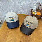 Unisex Kappe mit verspielter Bären-Stickerei