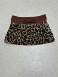 Damen eleganter Minirock aus fellartigem Material mit Modellknopf und Taillenband EB