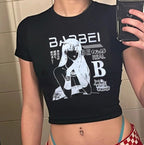 Damen Crop-T-Shirt mit kreativem Skelettdesign und inspirierendem Schriftzug EB
