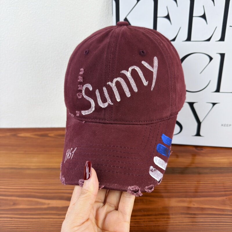 Damen-Baseballkappe mit Grafik im Used-Look