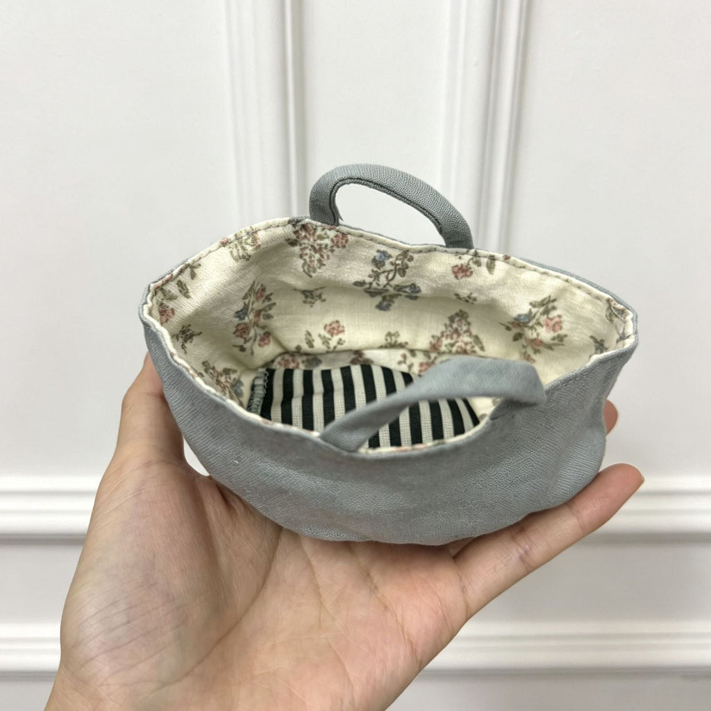 Wendbarer Baumwoll-Bucket-Hat mit Blumenfutter