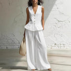 Damen lässiger Jumpsuit mit peplum Schnitt und Knopfdetails EB