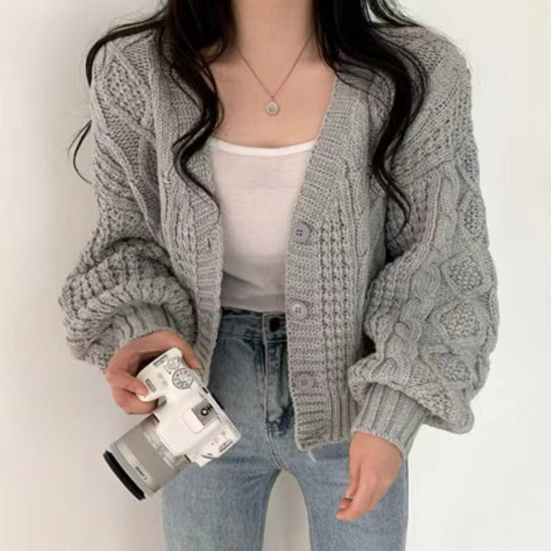 Damen Grobstrickjacke mit voluminösen Ärmeln und einzigartigem Zopfmuster EB
