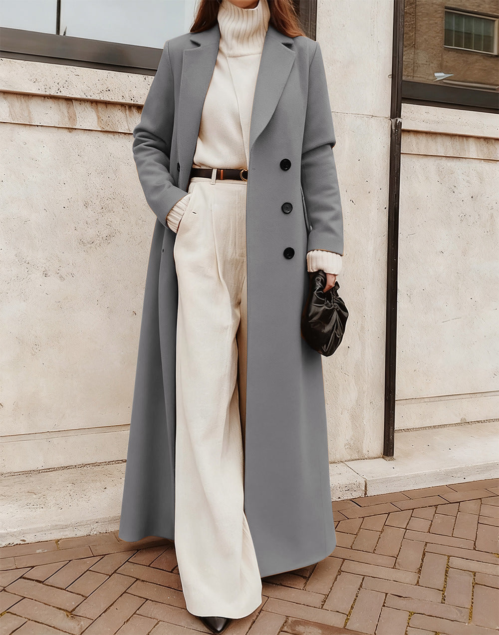 Eleganter Damenmantel, zweireihig geknöpft, tiefe Taschen. EB