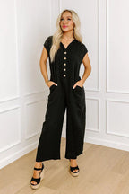 Damen Weitgeschnittener Jumpsuit mit Knopfleiste und Taschen EB