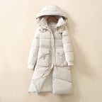 Damen Lange, warme Pufferjacke mit praktischen Taschen und Kapuze EB