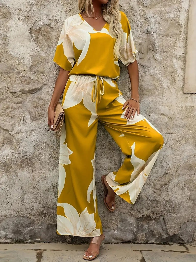 Damen Eleganter Jumpsuit mit floralen Mustern und weitem Bein EB