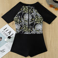 Damen Sporteinteiler mit floralem Design und kurzem Arm EB