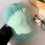 Damen Baseballcap im Distressed-Look