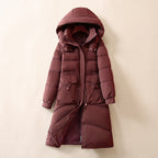 Damen Lange, warme Pufferjacke mit praktischen Taschen und Kapuze EB