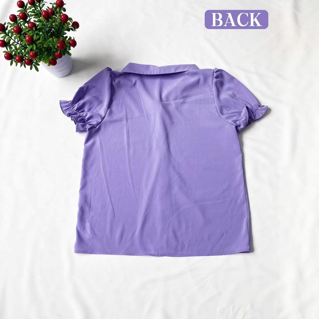 Damen Verspielt geschnittene Bluse mit Puffärmeln und Knopfdetails EB