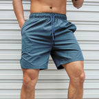 Atmungsaktive, einfarbige Badeshorts für Herren mit Kordelzug